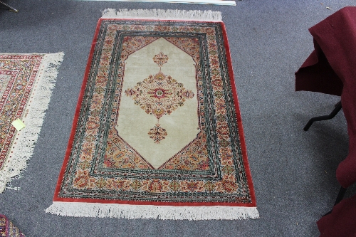 A Ghom silk rug, central Persia, late 20th Century,