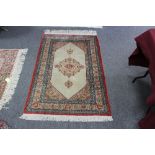A Ghom silk rug, central Persia, late 20th Century,