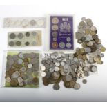 A small group of World coins to include sets from Hong Kong,