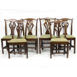 Six matched 19th Century elm country chairs, each with shaped back rail,