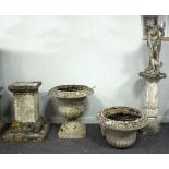 A stone figure on a fluted pedestal base, another pedestal, two garden vases etc.