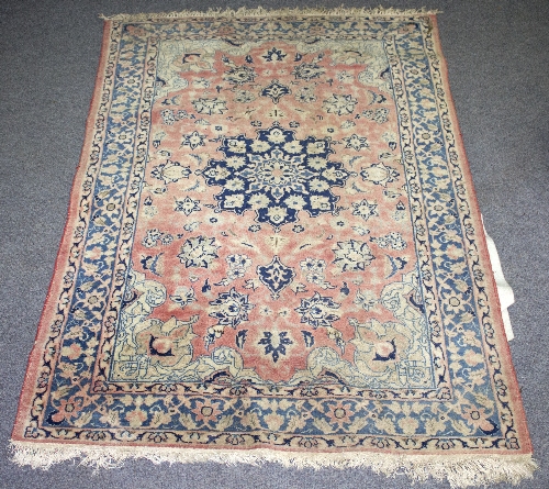 A Kazak rug worked in blue, brown and red, - Bild 4 aus 4