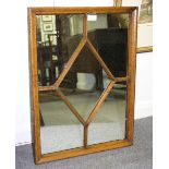 An oak framed window mirror, 47cm x 65cm and a framed machine made picture,