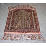 A modern Turkmen prayer rug, mid 20th century, with banded camel mihrab with multiple borders,