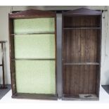 A near pair of 19th Century mahogany alcove bookcases with architectural pediments,