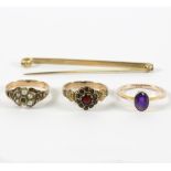 A Victorian garnet cluster ring, a seed pearl cluster ring similar, an amethyst single stone ring,