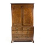 An early 19th Century mahogany linen press,