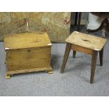 A small pine chest with hinged lid on ogee bracket feet,