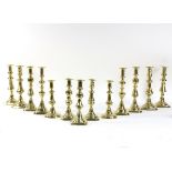 Five pairs of baluster brass candlesticks and three other candlesticks, 22.