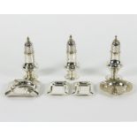 Three closely matched 18th Century silver pepper pots, each of baluster shape London 1757,