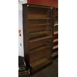 A 19th Century mahogany bookcase formerly part of a larger bookcase,