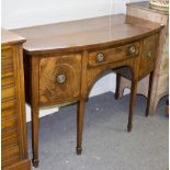 A Regency mahogany bowfront sideboard, fitted a single drawer flanked by two deep drawers,