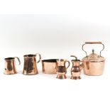 A copper kettle, two copper mugs,