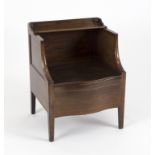 A mahogany serpentine front commode, with hinged shelf to the back and box seat,