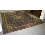 A modern machine made rug of Eastern design, 360cm x 320cm/Provenance: The Down House,