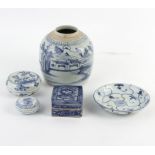Five pieces of Chinese cargo ware to include a blue and white ginger jar,
