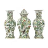 A garniture of three Chinese vases, Kangxi,