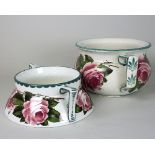 A Wemyss chamber pot, decorated roses, impressed mark to base,