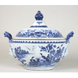 A 19th Century Nankin blue and white oval tureen with shaped mask head handles (one damaged),