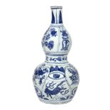 A Chinese blue and white kraak double gourd vase, circa 1600,