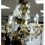 A gilt metal and cut glass chandelier, 70cm high/Provenance: The Down House,