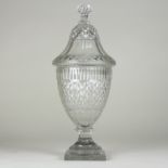 An Irish glass single lidded jar, 32.