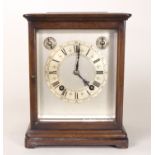 An oak cased four-glass eight-day mantel clock by Winterhalter & Hoffmeyer circa 1900,