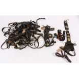 Harness: A quantity of leather harness to include stirrups and stirrup leathers, head collars,