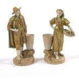 A pair of Royal Worcester porcelain figures of grape harvesters, modelled by James Hadley,