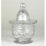 A small Irish glass lidded jar, cut with ovals and diamonds, 14.