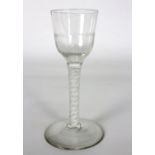 An 18th Century cordial glass with moulded ogee bowl and opaque twist stem, 14.