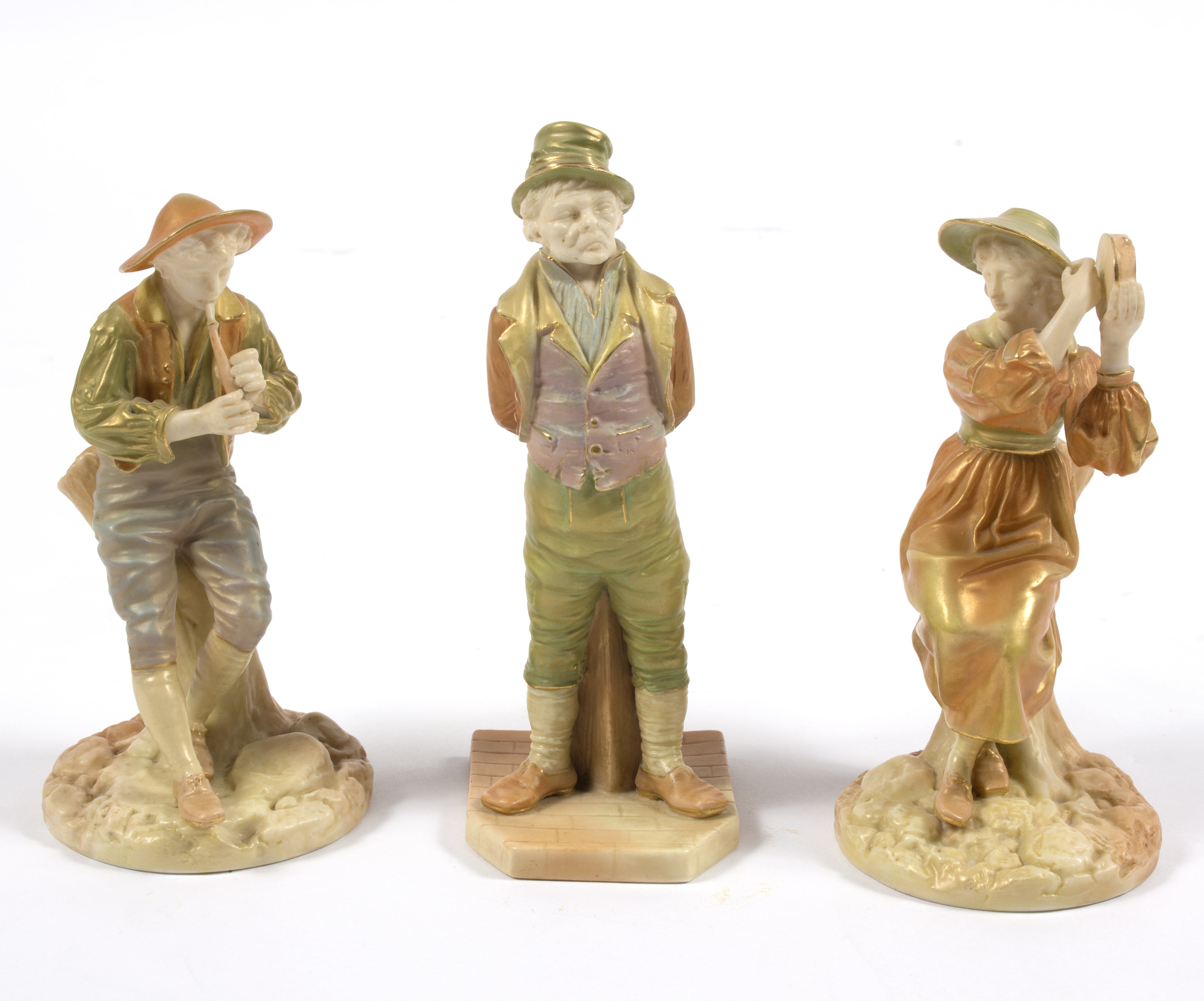 A pair of Royal Worcester figures of the Boy Piper Strephon and his female companion,