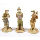 A pair of Royal Worcester figures of the Boy Piper Strephon and his female companion,