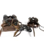 A group of various binoculars and cameras to include WWII leather cased examples