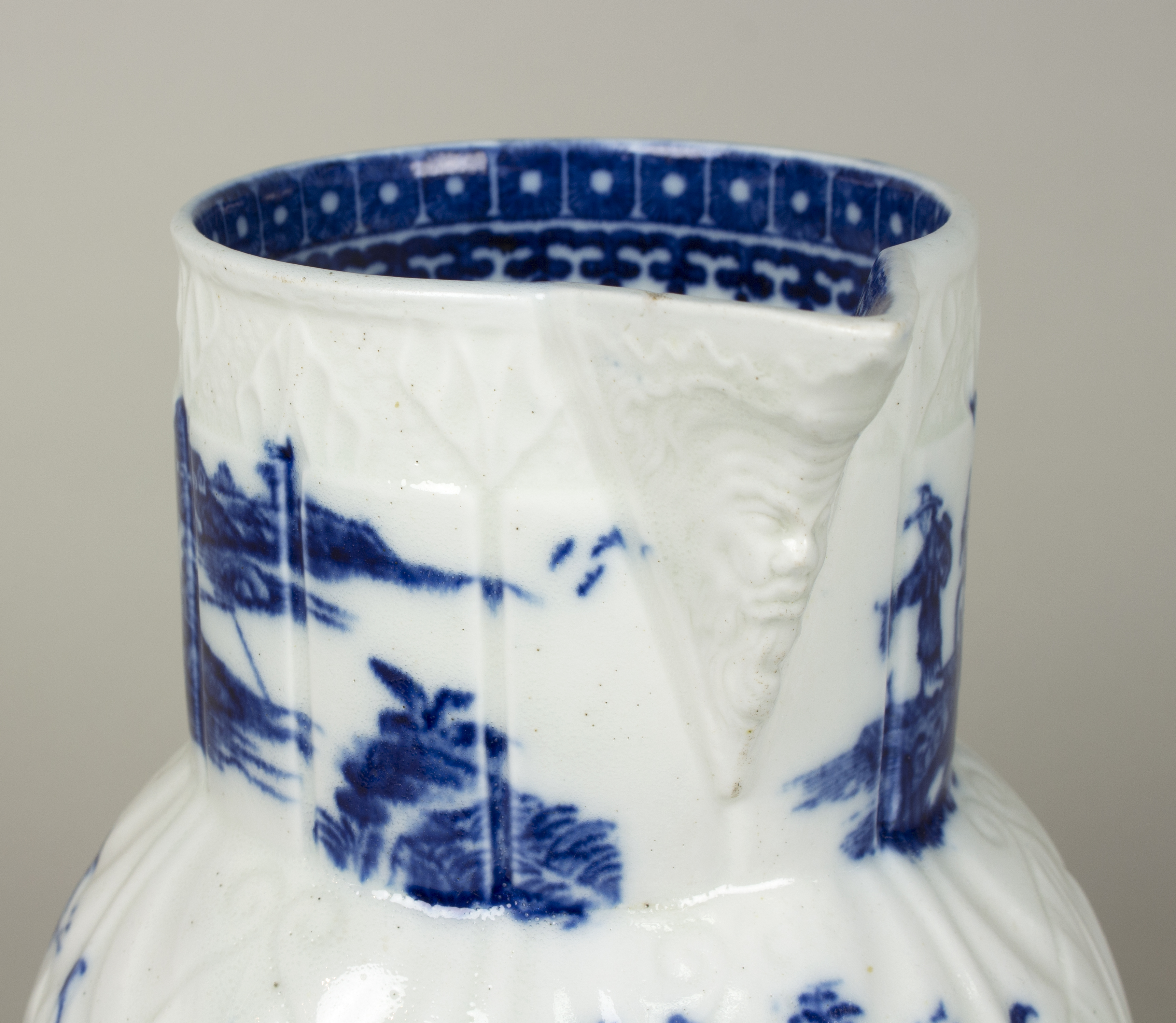 A Worcester blue and white cabbage-leaf moulded jug, circa 1780, printed with a Chinese fisherman, - Image 2 of 4