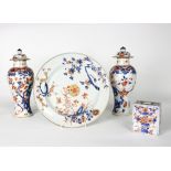 A Chinese Imari plate, Kangxi, decorated prunus branches and flowers, 18cm diameter,