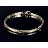 A 9ct gold bar bracelet of six oblong links, gross weight approximately 18.