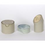 Stephen Jones (British, 20th Century)/Three porcelain boxes and covers/of asymmetric form,