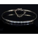 A diamond set bangle,