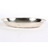 A George III oval silver entrée dish, John Eaton, London 1790, with thread border, crested,