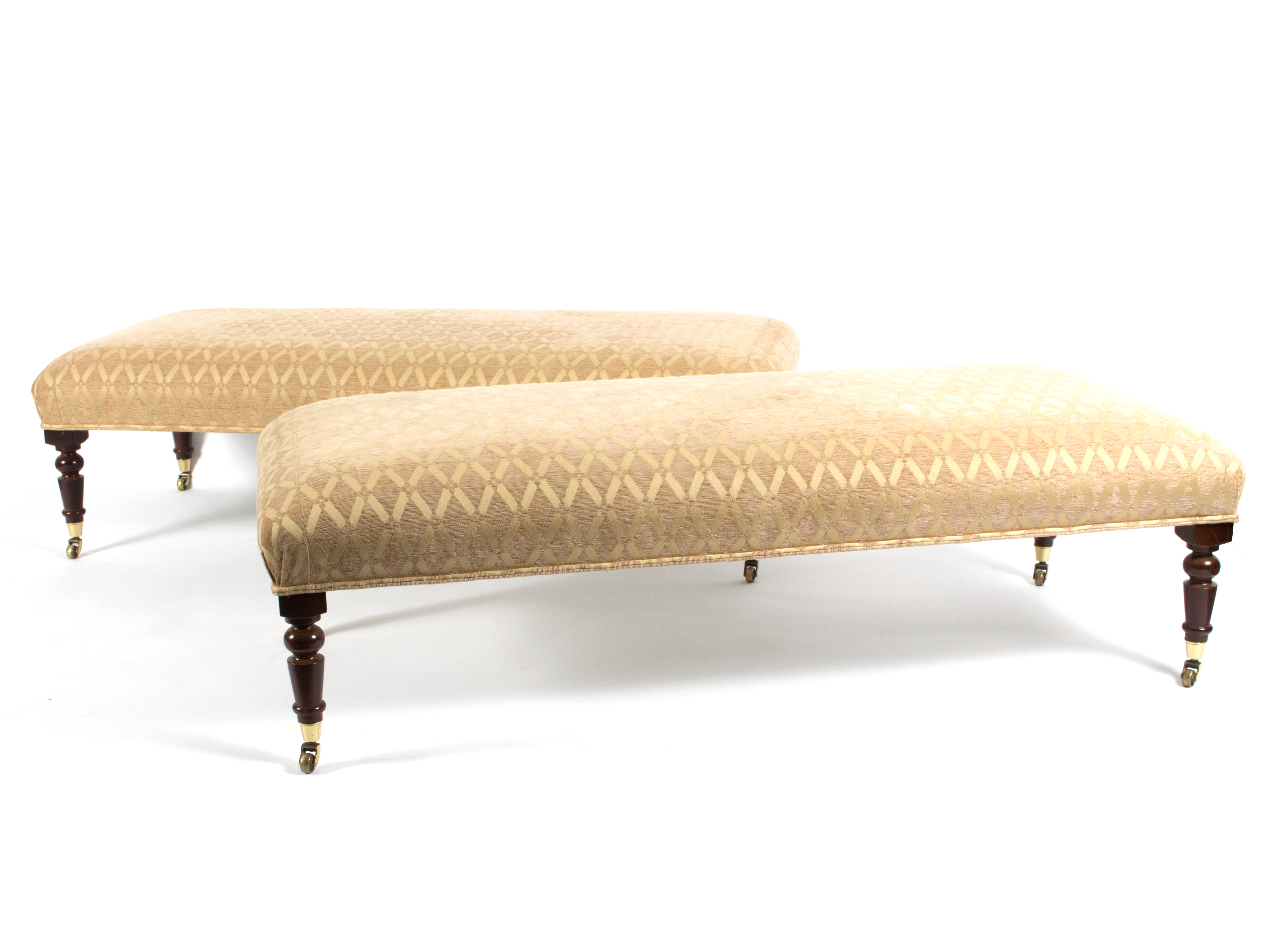 A pair of rectangular footstools with upholstered seats on turned legs,