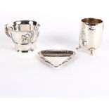 A silver cup with loop handle, GM & Co.