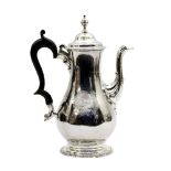 A George III silver coffee pot, Charles Wright, London 1777, of pear shape with beaded borders,