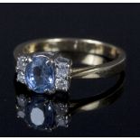 A sapphire and diamond dress ring, the oval mixed cut sapphire approximately 1ct,