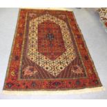 An Oriental rug of Senneh design, possibly Indian, 183cm x 112cm and another oriental rug,