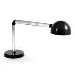 A bakelite and chrome desk lamp in the manner of Joe Colombo with swivel arm and shade,