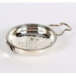 A George III silver lemon strainer, William Plummer, London 1781, with handle and clip,