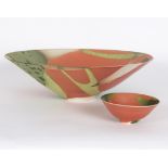 Suzanne Bergne (British, born 1939)/Large ceramic shallow bowl/glazed in orange, green and cream,