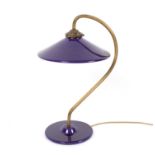 A Terre d'Hautaniboul desk lamp, with purple ceramic shade and stand on brass support,