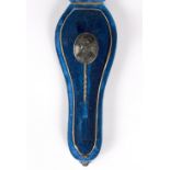A Victorian pin brooch, the oval mount set a jet carving of a maiden with a floral crown,